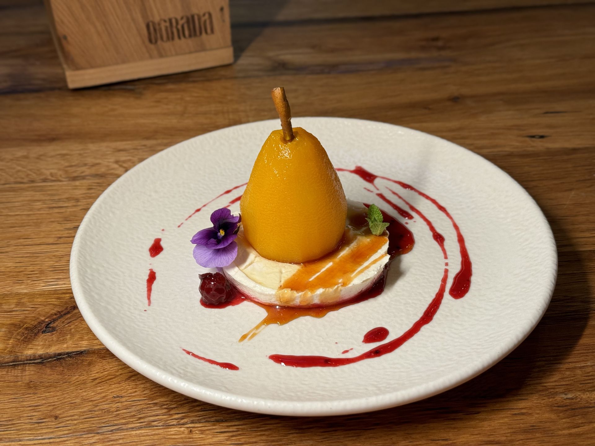Poached pear with white chocolate mousse